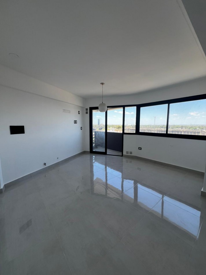 Departamento de 1 dormitorios y cochera, sobre Av. Alem